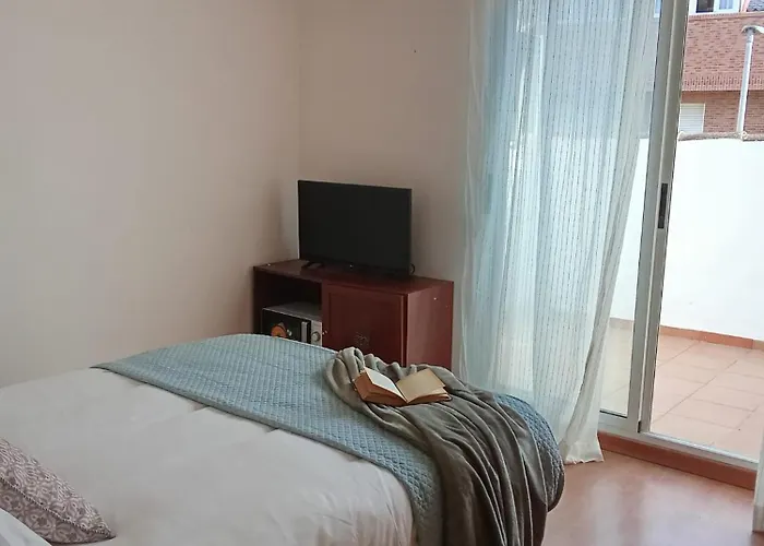 Δωμάτια σε οικογενειακή κατοικία Valencia Casa Rosa *